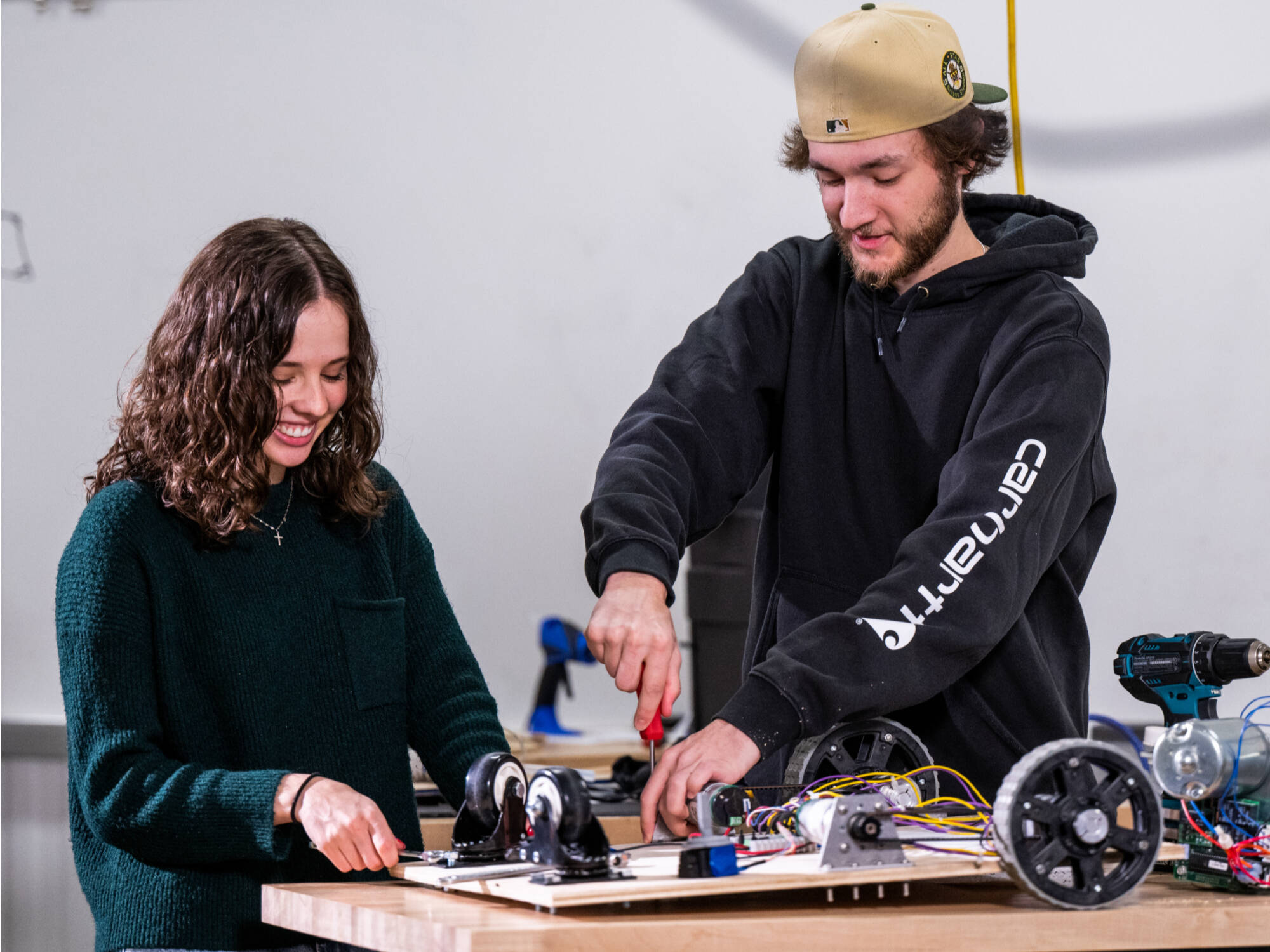 From left, Abby Robbins (biomedical engineering graduate student) and Alec Kent (product design and manufacturing engineering)(Photo releases on file)